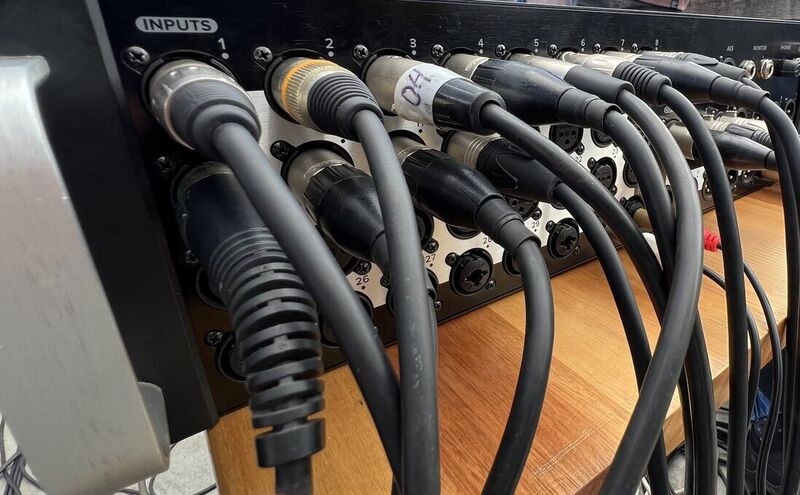 XLR multicore cables patched into a numbered stage box